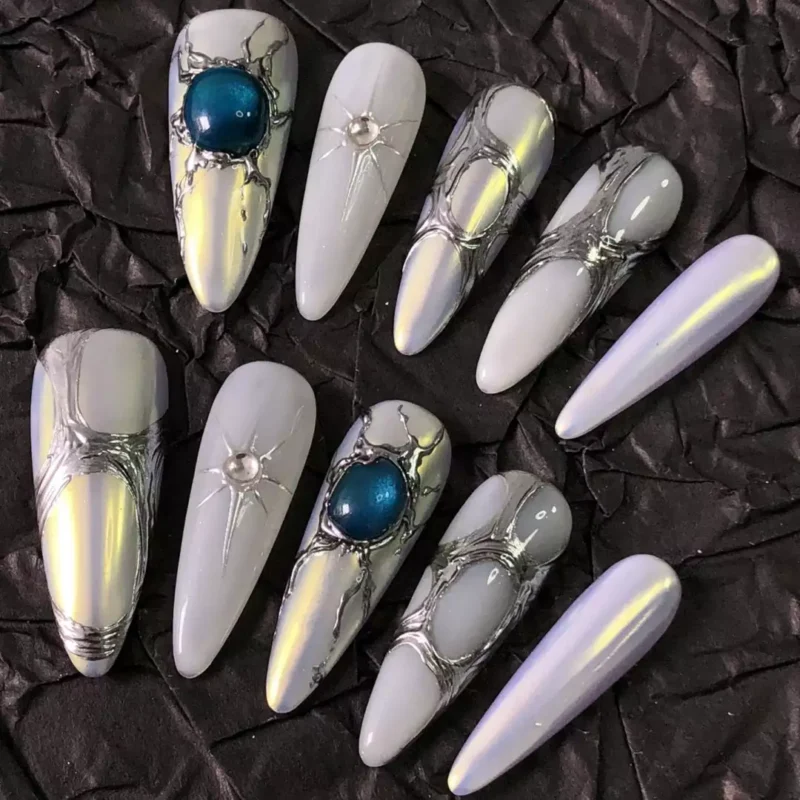 3D Blue Stone Press-On Nails with metallic star elements