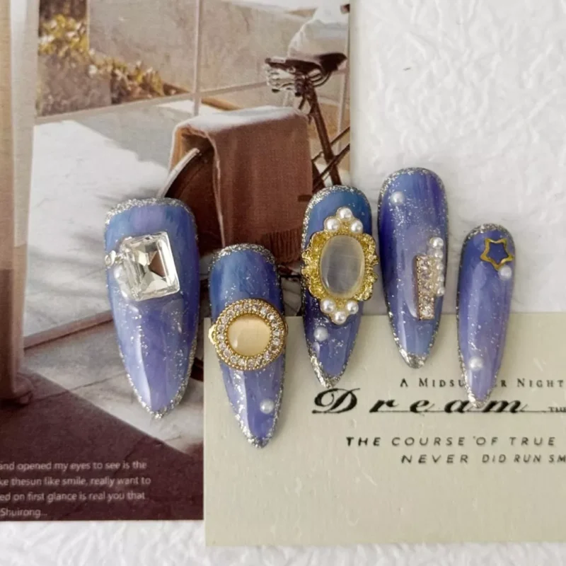 3D Charm Press-On Nails displayed with vintage decor background