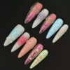 Assorted pastel 3D press-on nails with multicolor floral, bubble, and pearl accents – full front set view