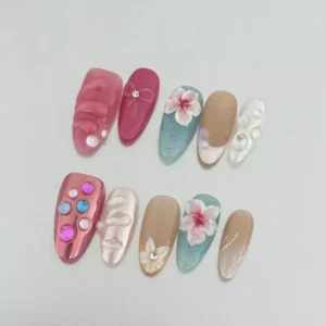 3D wave press-on nails with pastel gradients and tropical flowers