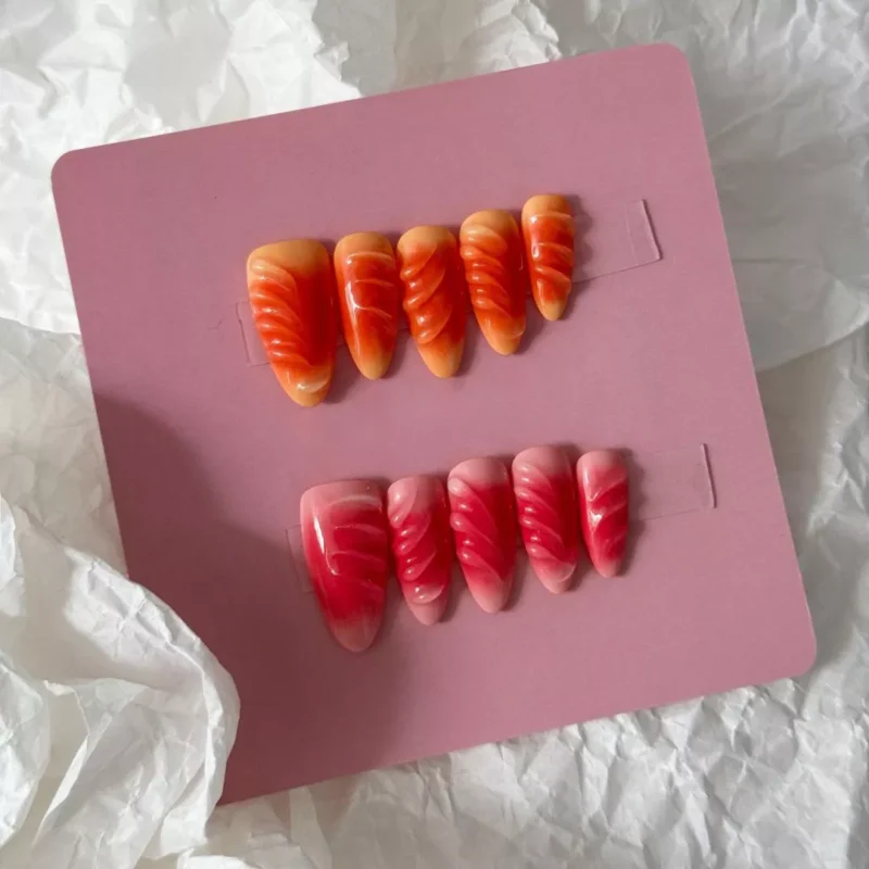 Gradient Press-On Nails displaying dynamic dual-color wave texture - artistic angle