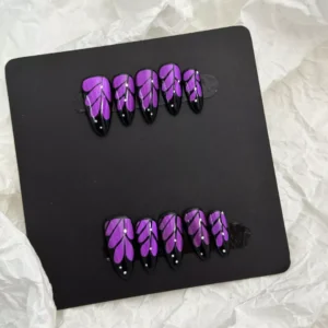 Artistic shot of Glitter Purple Press-On Nails featuring pastel shimmer and black outline design
