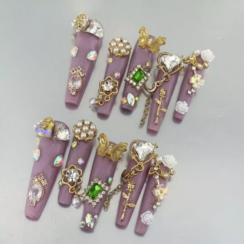 Lavender base Baroque Style Nails featuring heart crystals, roses, and vintage gold key charms