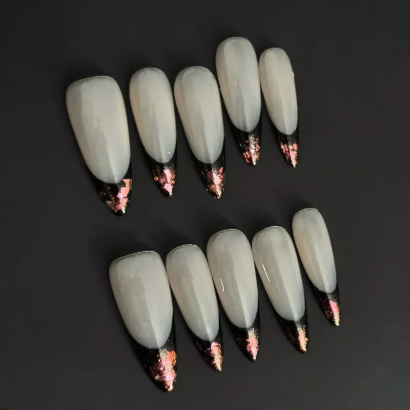 Black French Press-On Nails with nude base and foil tip design