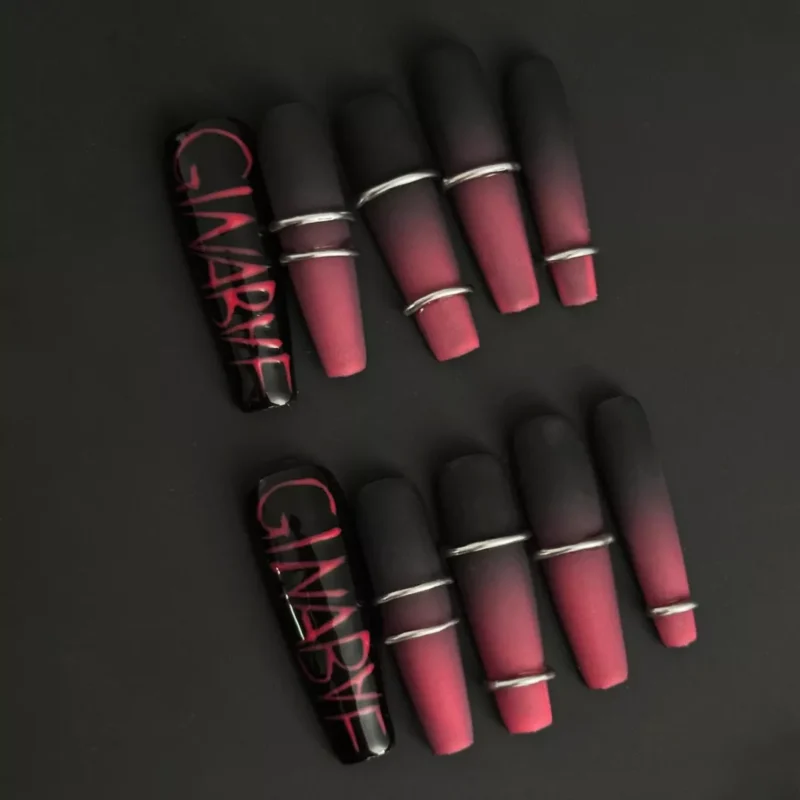 Dark Graffiti Press-On Nails with red-black gradient and silver rings