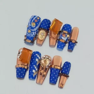 Blue and gold foil square nails with vintage gem accents