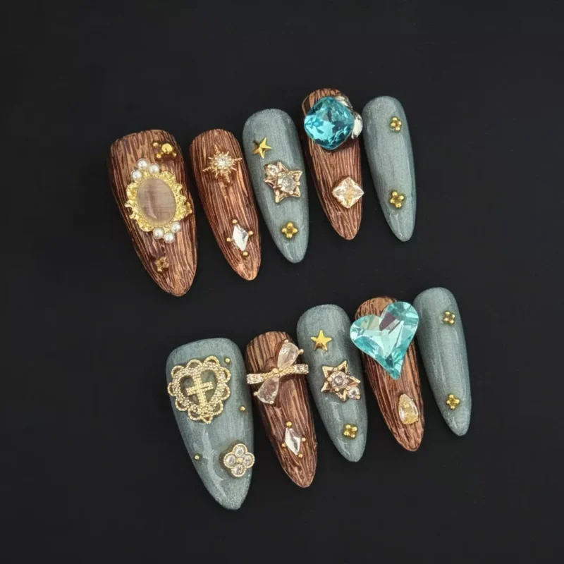 Celestial Press-On Nails with blue gems and wood grain texture