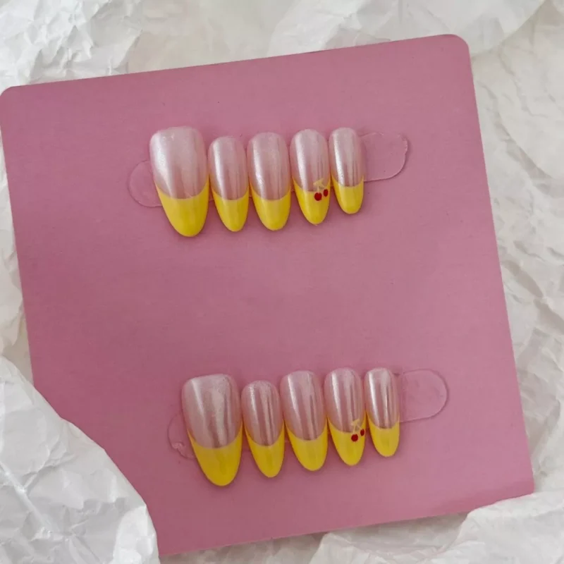 Chrome and Yellow Press-On Nails with cherry art - full set display
