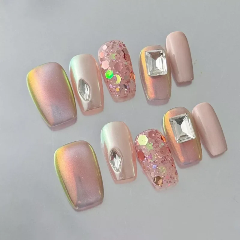 Close-up of Square Gem Press-On Nails featuring holographic glitter and rhinestone details