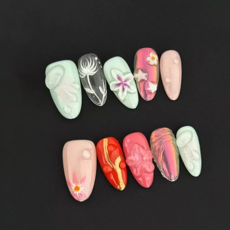 Colorful floral press-on nails with 3D carving and artistic pastel flowers