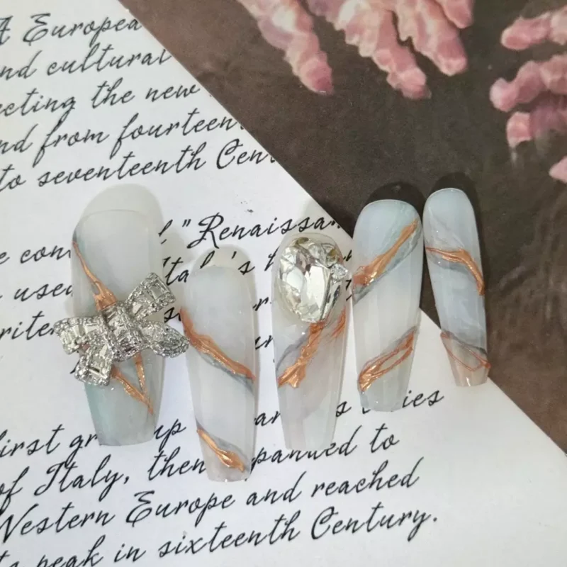 Rhinestone Accent Nails in Gray Marble Ribbon Design