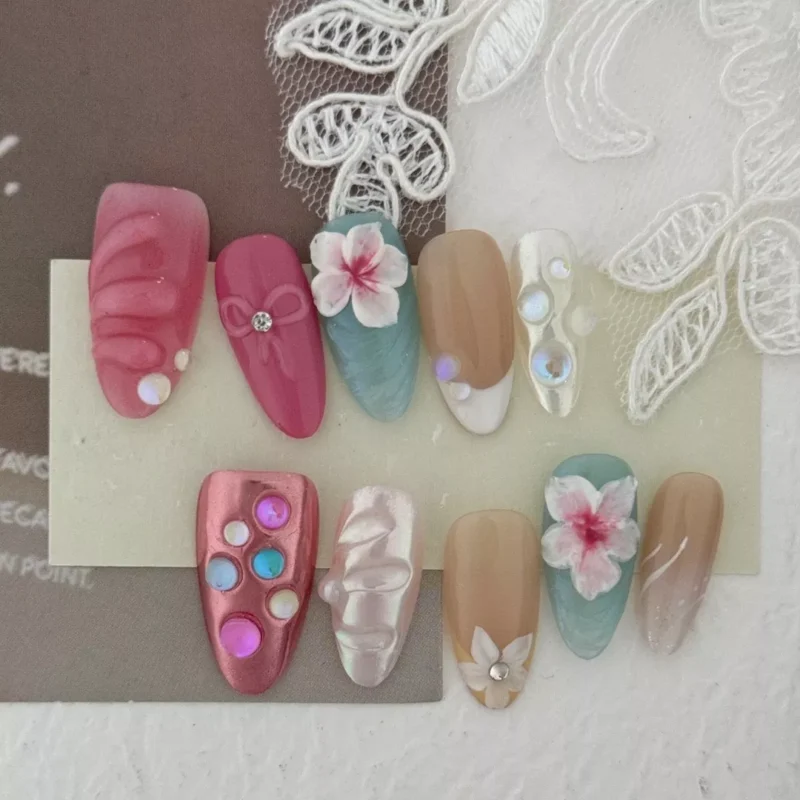 Crystal shell press-on nails with beach-inspired design and shimmer