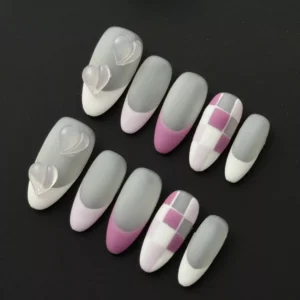 Cute mixed design press-on nails in grey, pink, and white with checkerboard and 3D heart accents – full set view