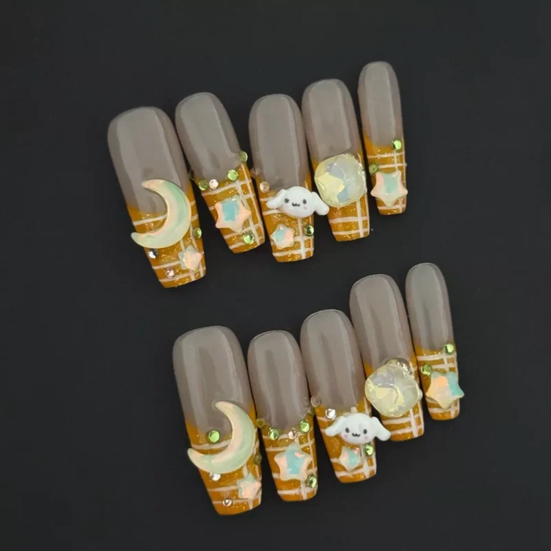cute plaid press-on nails with puppy charms and orange glitter base