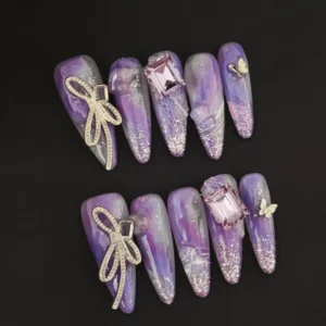 Twilight Butterfly Press-On Nails with purple gradient and bow charms