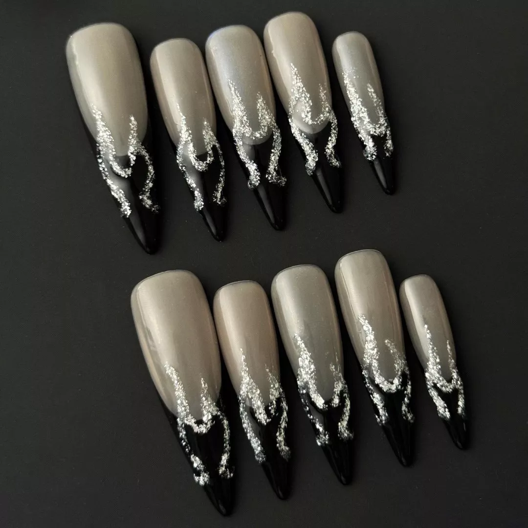 Silver Flame Press-On Nails - Nude Base with Black French Edge 3 Edgy glam stiletto nails with nude base and silver glitter flames