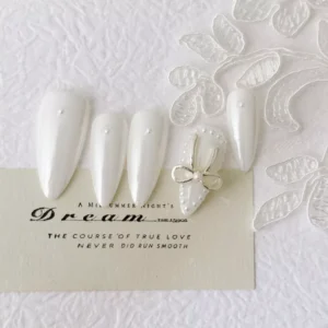 Pearl White Press-On Nails displayed with lace backdrop for elegant styling