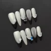 Monochrome Elegance Press-On Nails with Black & White French Design and Pearl Accents