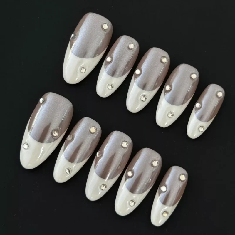Elegant Nude Press-On Nails with White French Tips and Rhinestone Accents – Top View