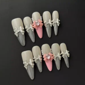 French Bow Press-On Nails in soft pink with 3D bows and chrome tips