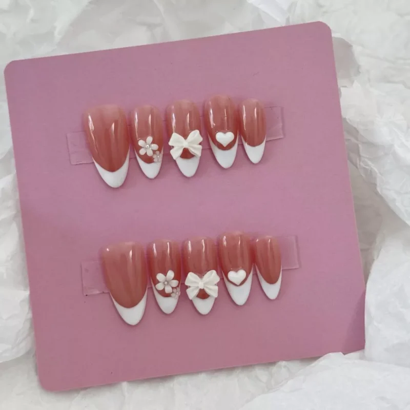 Nude French Press-On Nails full set with 3D bow and heart embellishments