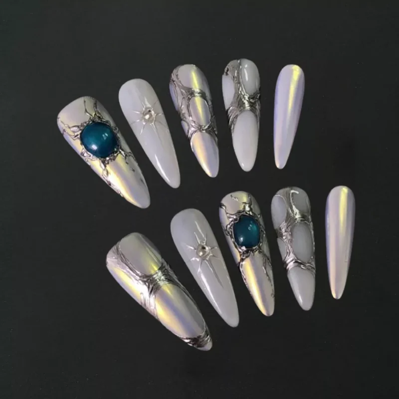 Galaxy Shine Press-On Nails with chrome base and blue 3D gemstone centerpiece