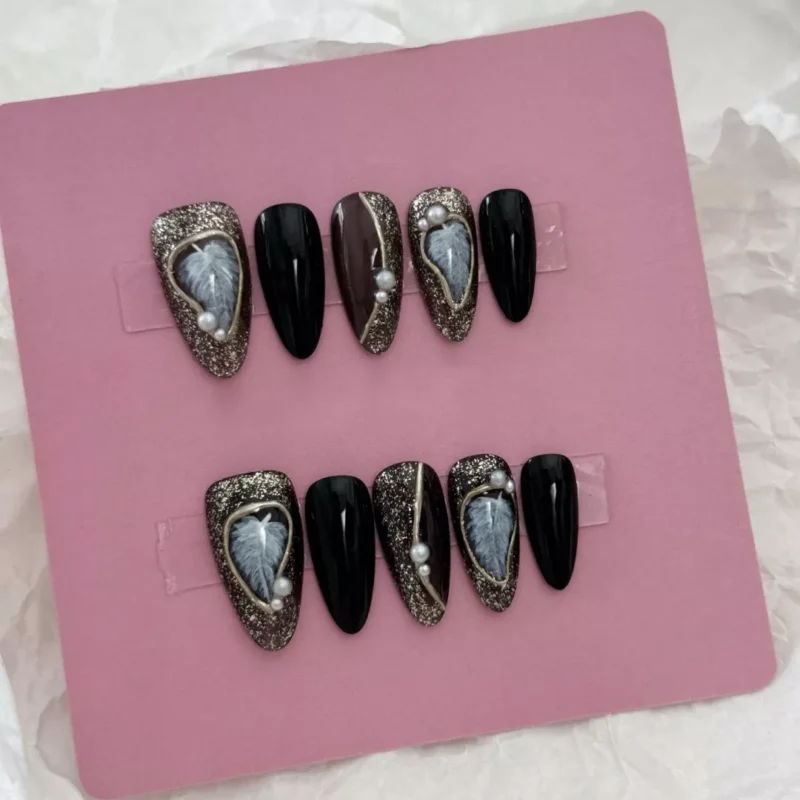 Side view of Black Glitter Press-On Nails showcasing feather textures