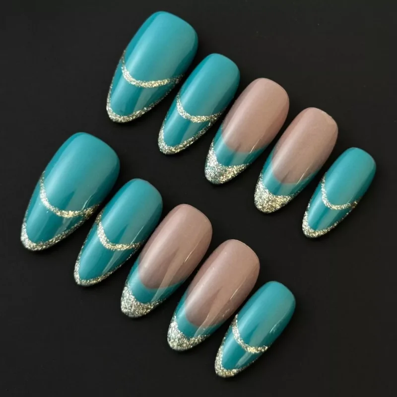 Glitter Edge Press-On Nails with teal tips and nude base – front view