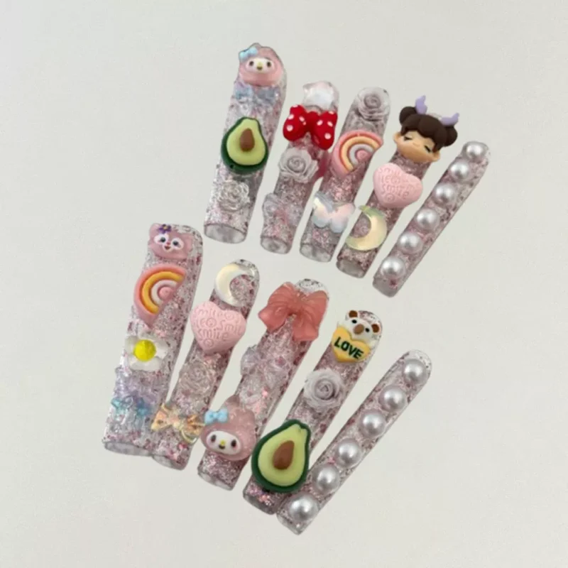 Long coffin glitter press-on nails with multicolor kawaii 3D charms including pearls and candy hearts