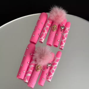 Pink glitter press-on nails with leopard texture and fluffy pom-poms