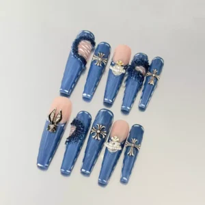 Close-up of Denim Blue Press-On Nails with glossy finish and metal accents