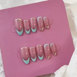 Gold Edge Press-On Nails arranged in set layout with nude base and cool tone tips