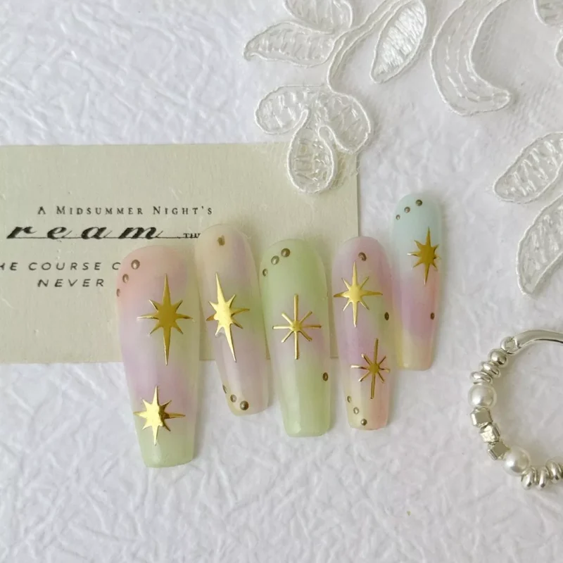 Golden Star Press-On Nails pastel set with white lace background