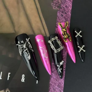Artistic Gothic Charm Press-On Nails displayed on Halloween-themed backdrop
