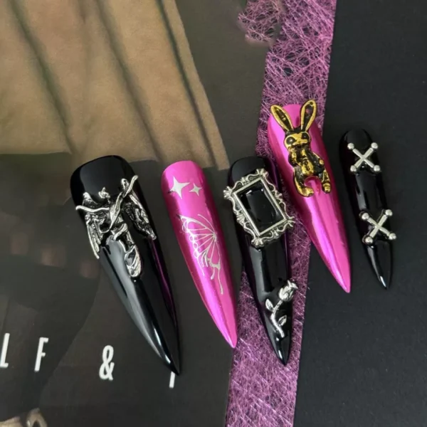 Artistic Gothic Charm Press-On Nails displayed on Halloween-themed backdrop