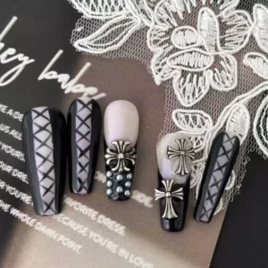 Gothic black press-on nails on lace background