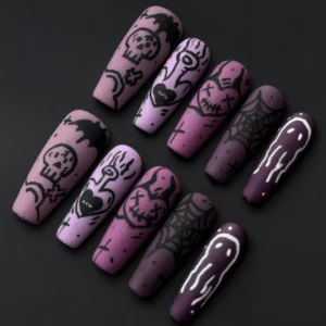 Gothic doodle art press-on nails featuring purple gradient and black spooky icons including ghosts and skulls – front view