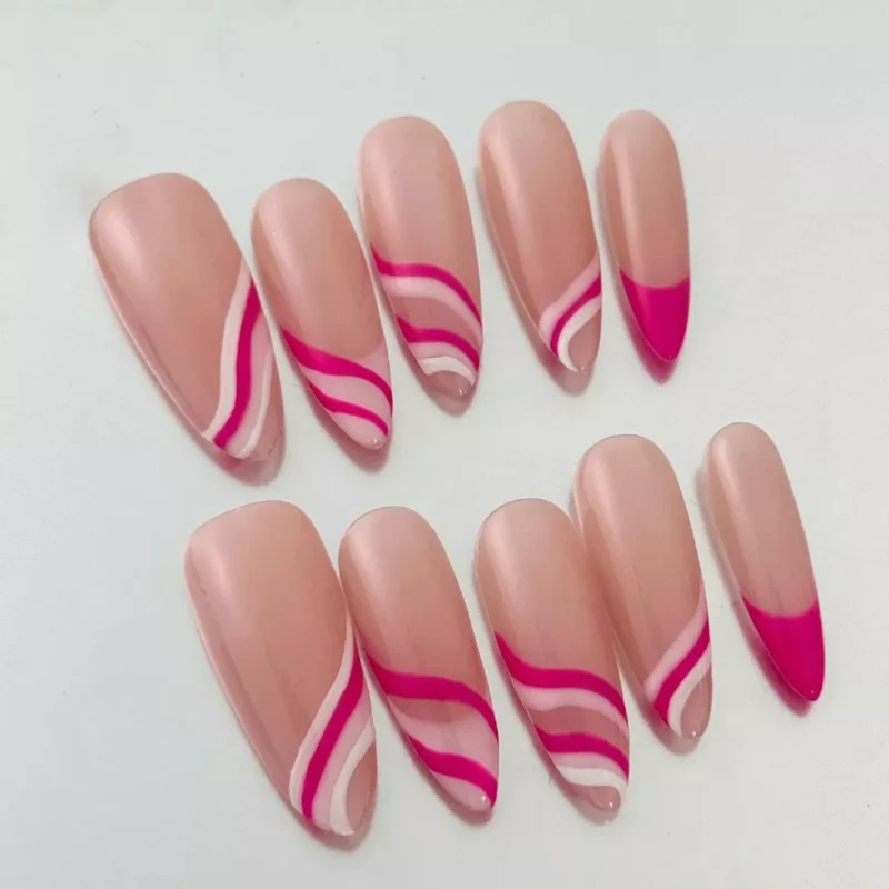Long nude almond nails with angled hot pink French tips – side perspective