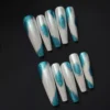Icy Teal Press-On Nails with pearl white base and chrome teal wave design