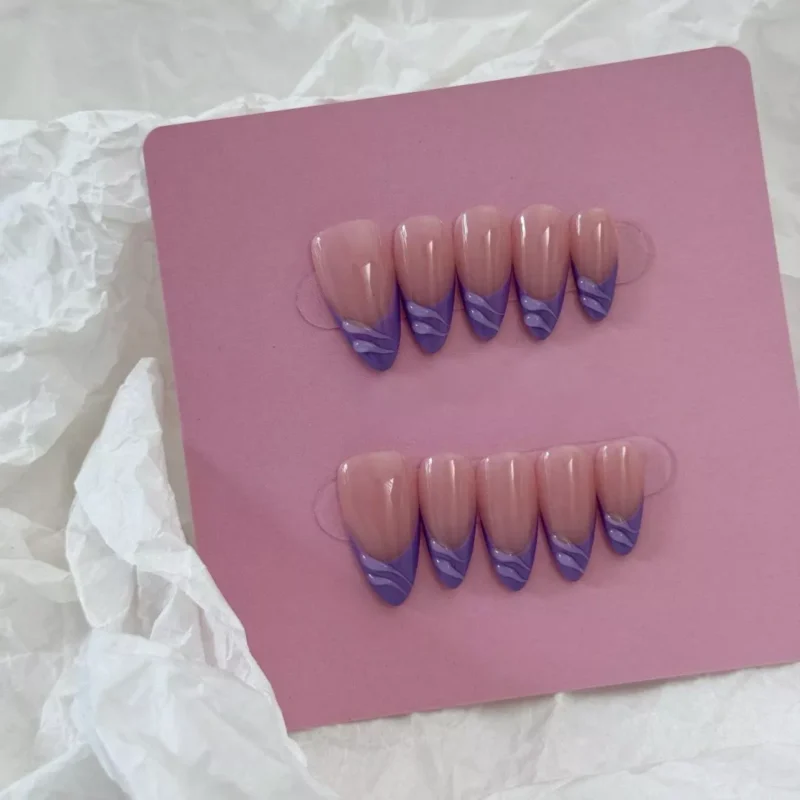 Long nude purple nails with abstract 3D French wave tips and glossy surface
