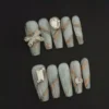 Gray Marble Ribbon Press-On Nails with Rhinestone Bow Design