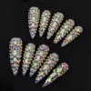 Full view of luxury rhinestone press-on nails with iridescent gems – stiletto shape