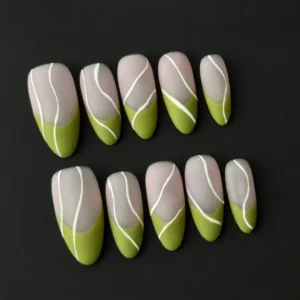 Almond-shaped nude green press-on nails with matte finish and minimalist graphic accents
