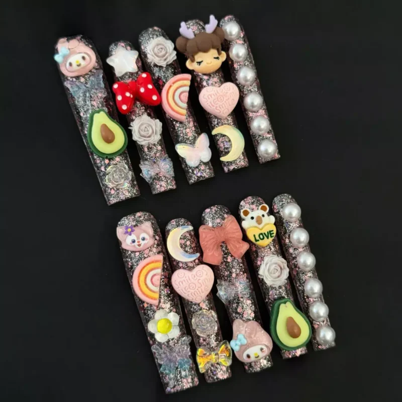 Maximalist Kawaii Press-On Nails with glitter base, heart gems, and pink bow accents – top view
