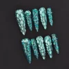 Midnight Ocean Press-On Nails with full rhinestone armor on teal glitter stiletto tips