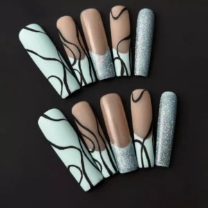 Mint nude press-on nails with black wave line accents and glitter tips – full set top view