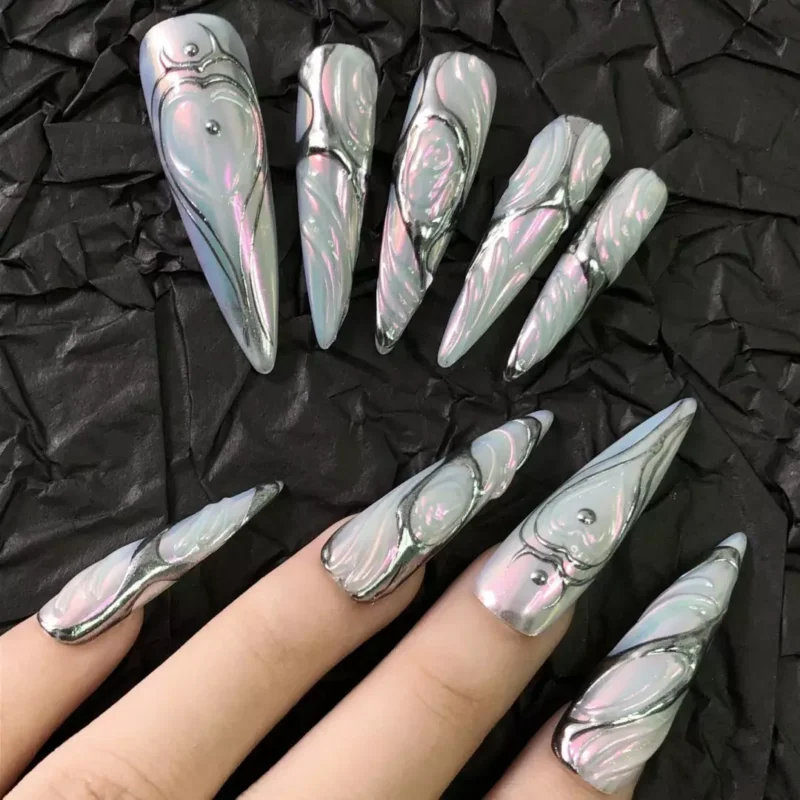 Hand model wearing White Metallic Chrome Swirl Press-On Nails