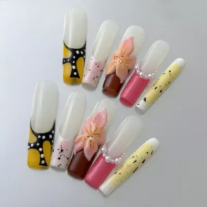 Almond multicolor press-on nails with pink, yellow, and nude gradient tones