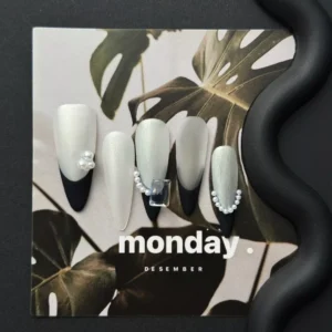 Elegant Black French Tip Press-On Nails with Pearl and Crystal Embellishments