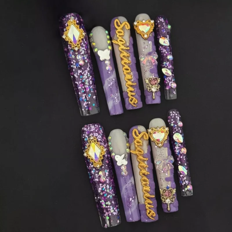 Mystic Zodiac Press-On Nails with purple glitter and Sagittarius gold charm